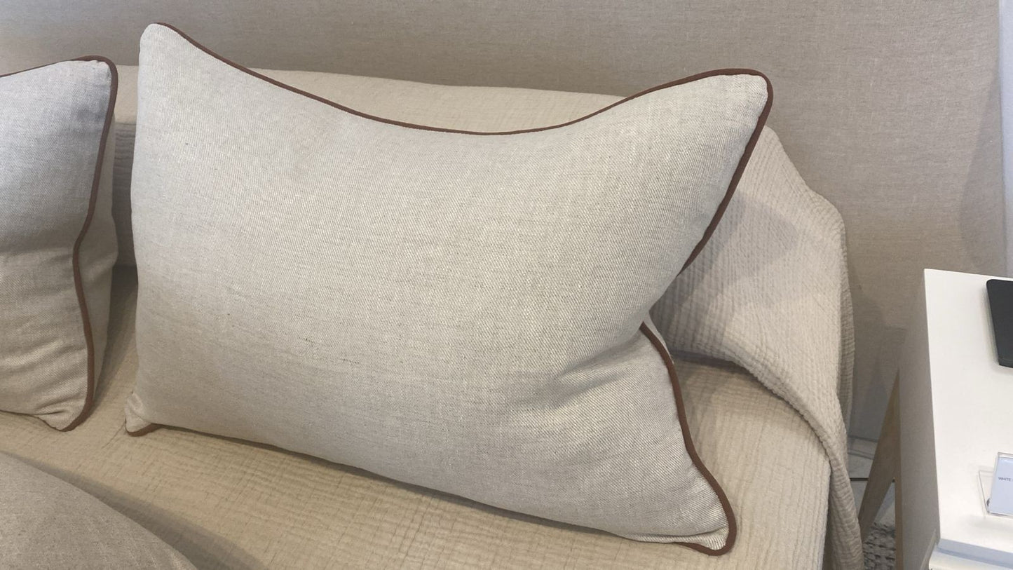 Natural cushion with rust piping - Includes feather inner