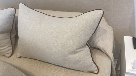 Natural cushion with rust piping - Includes feather inner